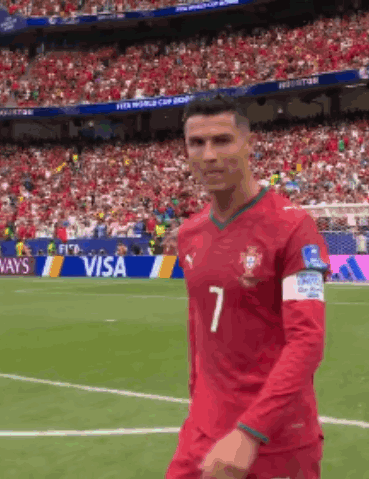 A Soccer Player With The Number 7 On His Jersey Is Walking On The Field GIF
