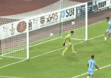 A Soccer Player With The Number 7 On His Jersey Kicks The Ball Towards The Goal GIF