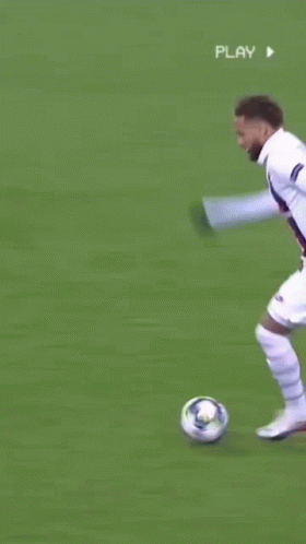 A Soccer Player With The Number 7 On His Shirt Is Running Towards Another Player On The Field . GIF