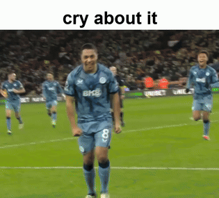 a soccer player with the number 8 on his jersey is running on the field