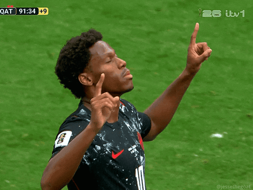 A Soccer Player With The Number 8 On His Jersey Prays On The Field GIF