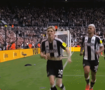 A Soccer Player With The Number 80 On His Shorts Is Running Towards The Goal GIF