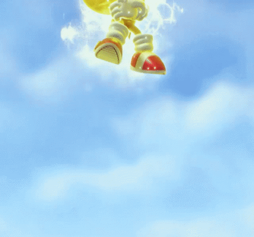 A Sonic The Hedgehog Is Flying Through The Air With A Blue Sky In The Background GIF