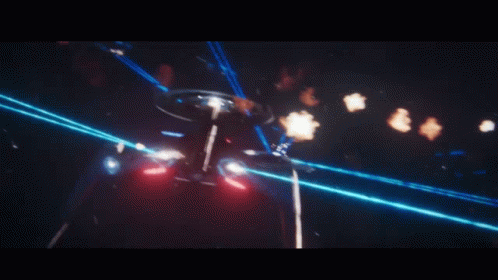 a space ship is being attacked by a bunch of laser beams