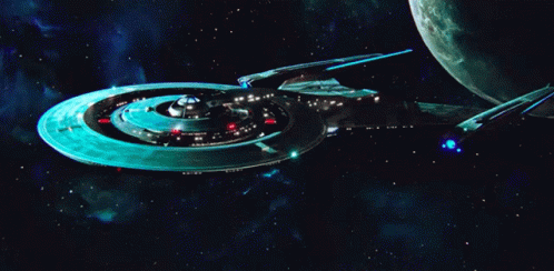 A Space Ship With A Blue Light Coming Out Of The Side GIF