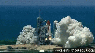 A Space Shuttle Is Being Launched Into Space And Smoke Is Coming Out Of It GIF