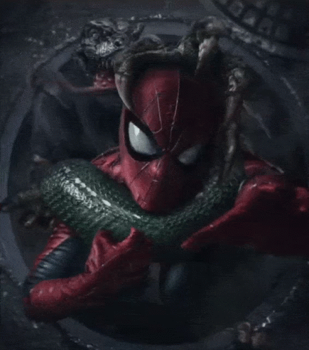 A Spider Man Holding A Green Snake In His Hands GIF
