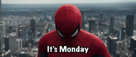 A Spider Man Says It 'S Monday In Front Of A City Skyline . GIF