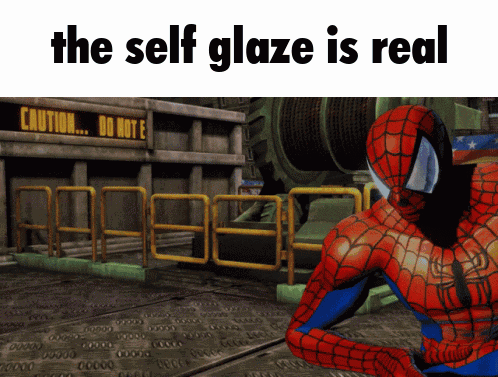 A Spider Man Standing In Front Of A Sign That Says Caution GIF