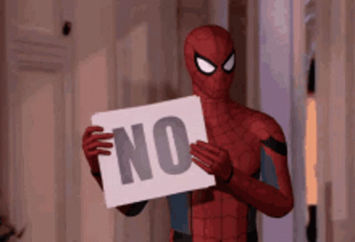 A Spiderman Holding A Sign That Says No GIF
