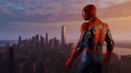 A Spiderman Standing In Front Of A City Skyline GIF