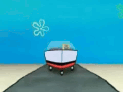 A Spongebob Squarepants Boat Is Driving Down A Beach GIF
