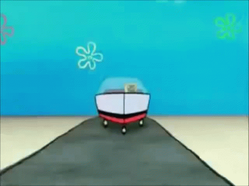 A Spongebob Squarepants Boat Is Driving Down A Road Next To A Cliff . GIF