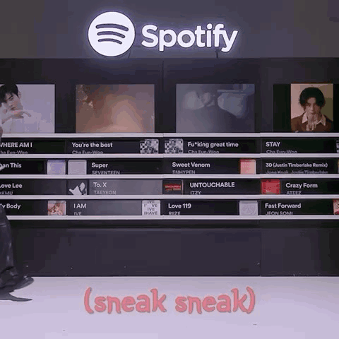 A Spotify App Is Displayed On A Shelf GIF