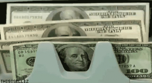 A Stack Of 100 Dollar Bills Being Counted GIF