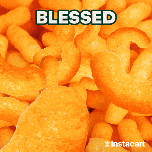 a stack of chocolate chip cookies with the word blessed on top