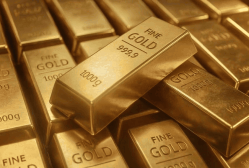 A Stack Of Gold Bars That Are 999.9 Fine Gold GIF