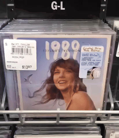 Stack Of Taylor Swift 1989 Albums GIF