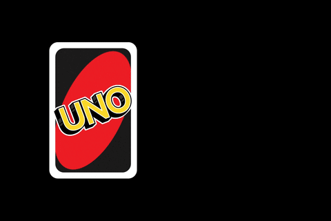 A Stack Of Uno Cards With One Being Turned Over GIF