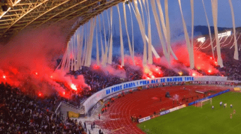 a stadium full of people with a banner that says " na fudbs grada "