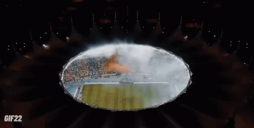 A Stadium Full Of People With A Banner That Says ' Nas ' On It GIF