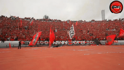 a stadium full of people with a banner that says winners 20