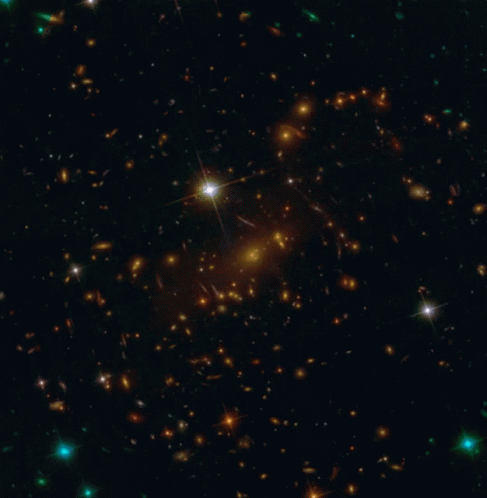 Star In Middle Of Galaxy In Night Sky GIF