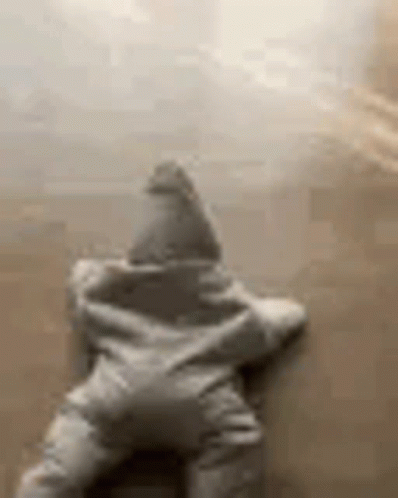 A Star Shaped Pillow Is Sitting On A Couch . GIF