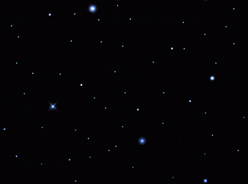 A Star Shines Brightly In A Dark Night Sky GIF