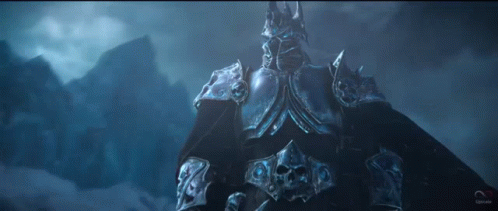 A Statue Of A King With A Crown And Skulls On His Armor . GIF