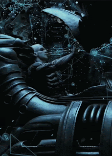 A Statue Of A Man In A Space Suit Is Surrounded By Bubbles And A Globe GIF