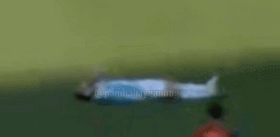 A Statue Of A Man Laying Down With The Word Monkey On The Bottom GIF