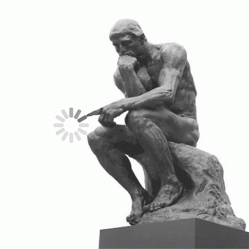 A Statue Of A Man Sitting On A Rock Pointing At A Loading Circle GIF