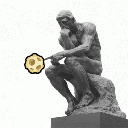 A Statue Of A Man Sitting On A Rock With A Cookie Coming Out Of His Hand GIF