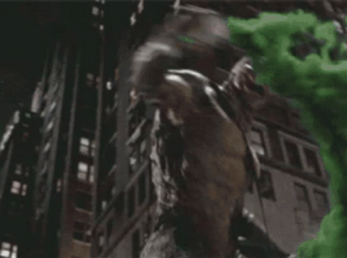 A Statue Of A Man With A Green Smoke Coming Out Of His Mouth . GIF