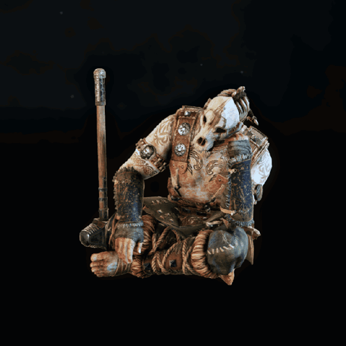 A Statue Of A Man With A Hammer And A Sword GIF
