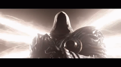 A Statue Of A Man With A Hood On His Head GIF