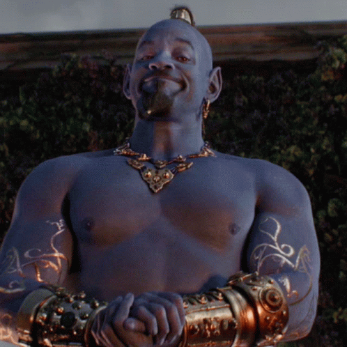A Statue Of A Man With Blue Paint On His Torso And Arms GIF