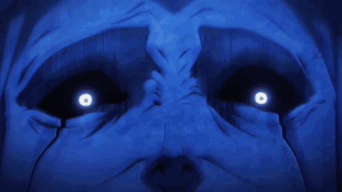 A Statue Of A Man With Glowing Eyes GIF