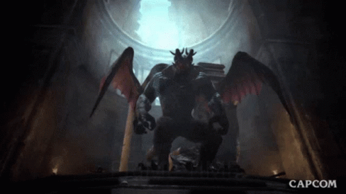 A Statue Of A Monster With Wings And The Capcom Logo GIF