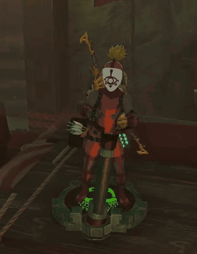 a statue of a person with a mask on their head