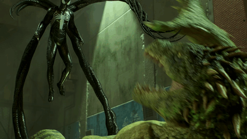 A Statue Of A Spider Man Standing Next To A Large Green Monster GIF