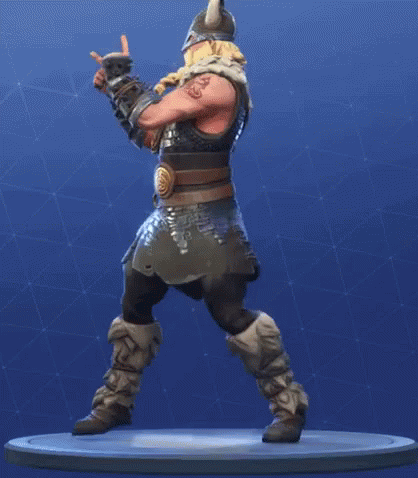 A Statue Of A Viking Wearing A Horned Helmet And A Beard Is Standing On A Pedestal . GIF