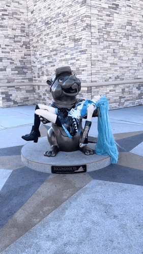 A Statue Of A Woman Laying On Top Of A Rockingham Va Statue GIF