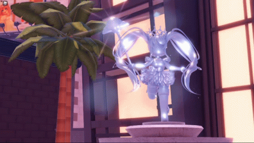 A Statue Of A Woman With A Crown On Her Head Is In Front Of A Palm Tree GIF