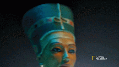 A Statue Of A Woman With A National Geographic Logo In The Corner GIF