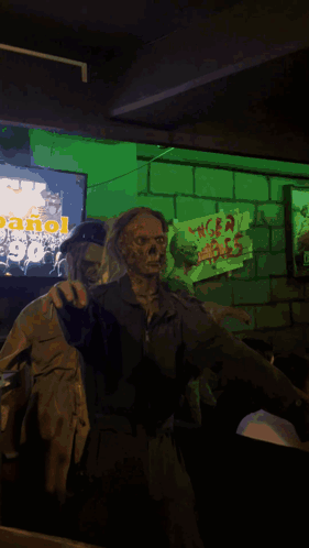 A Statue Of A Zombie Wearing A Goggles And Holding A Yellow Sign With A Hand On It GIF