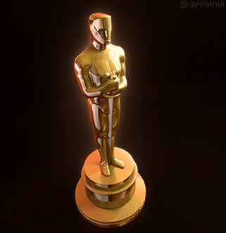 A Statue Of An Oscar Winner On A Pedestal With Gifmania Written On The Bottom GIF