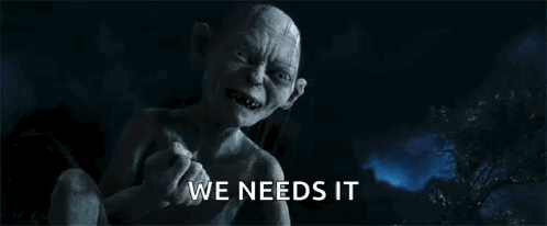 A Statue Of Gollum From The Lord Of The Rings Is Sitting In The Dark And Says `` We Need It '' . GIF