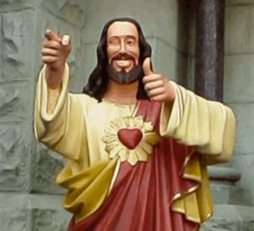 A Statue Of Jesus Is Giving The Thumbs Up Sign GIF